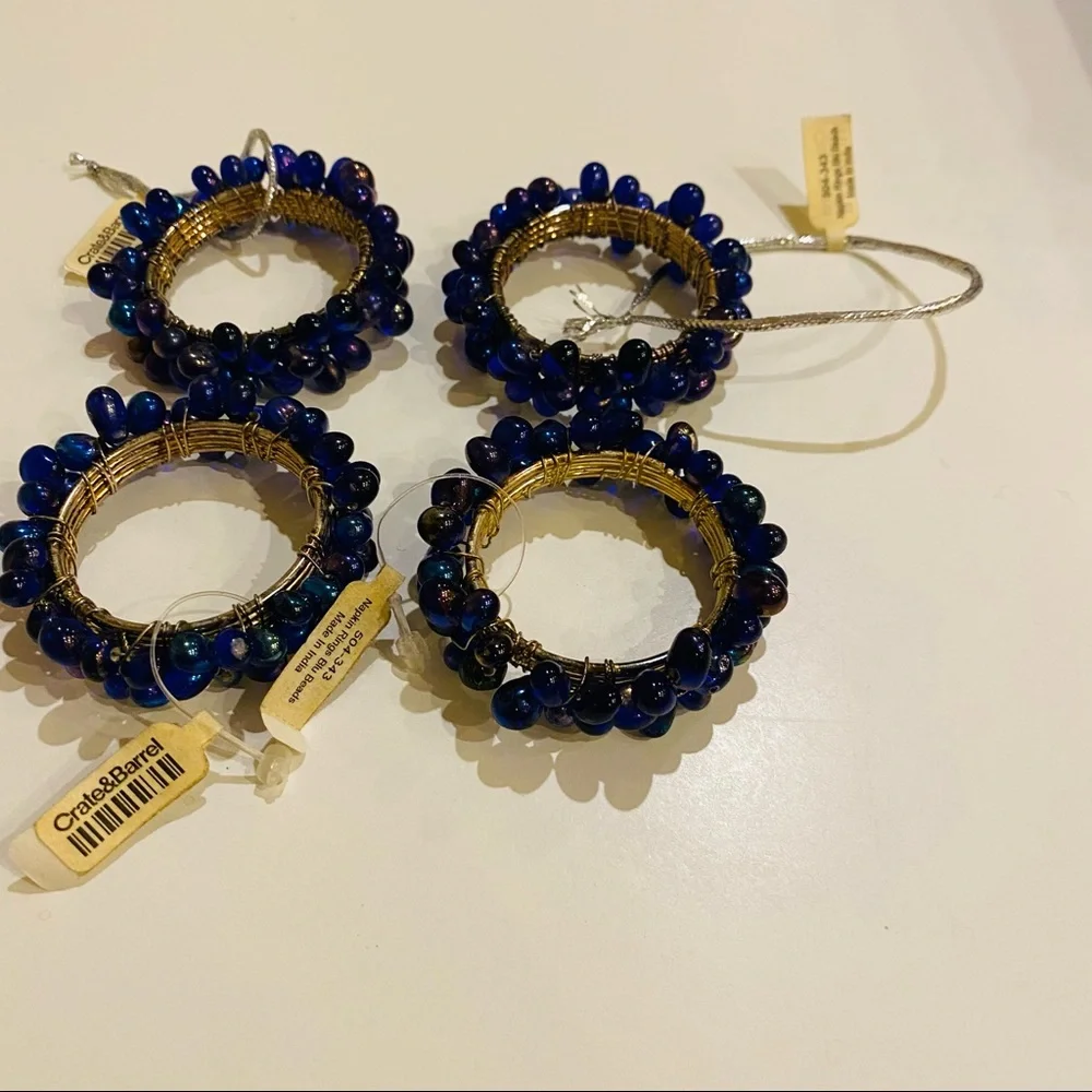 NWT Crate & Barrel 4 Napkin Rings.Blu Iridescent Beads.Great for casual or party
